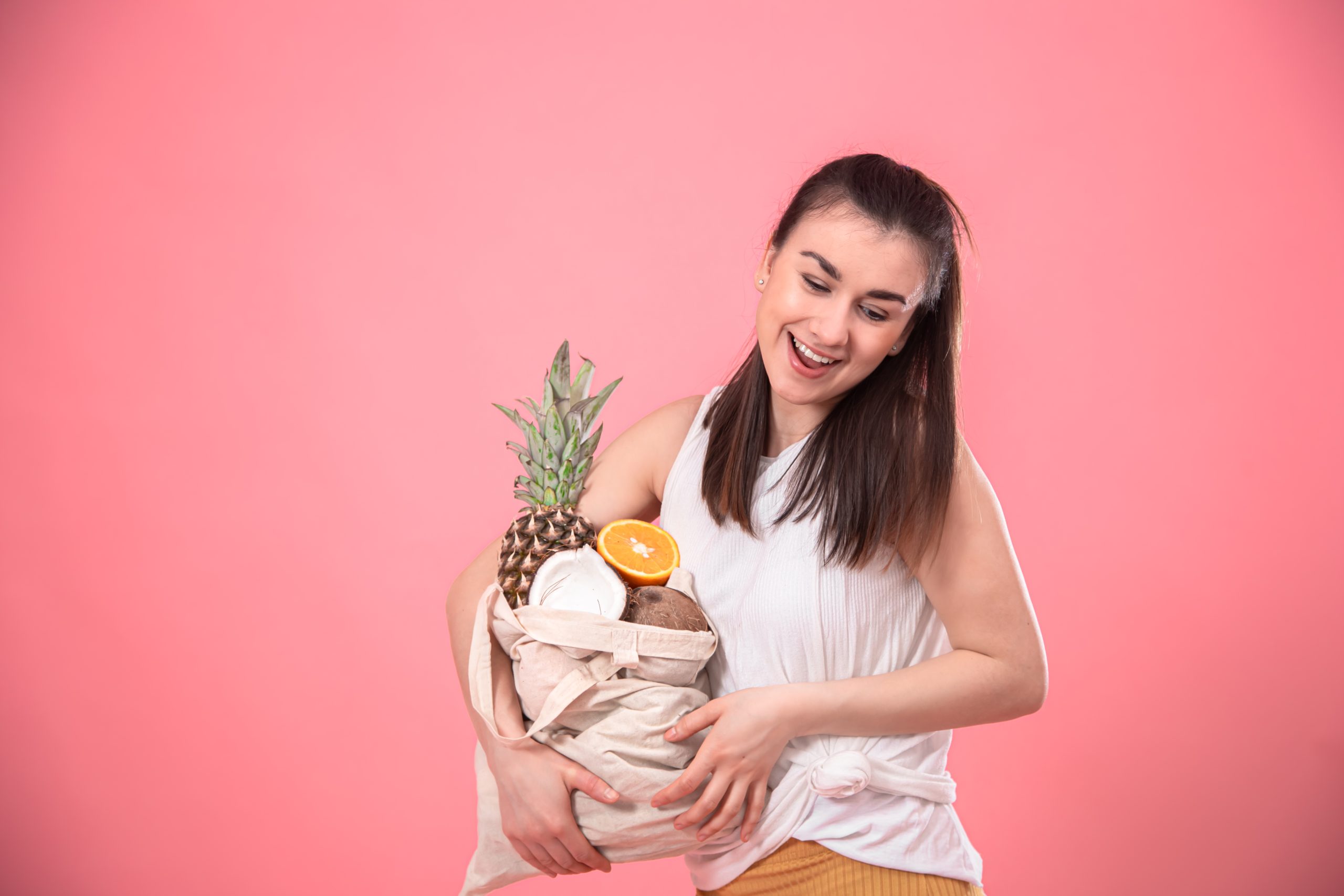 portrait young stylish woman with eco fruit bag 1 scaled